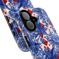 Tough phone case with a blue toile-inspired floral pattern and red patriotic stars from the America 250th Anniversary collection, shown at an angle.