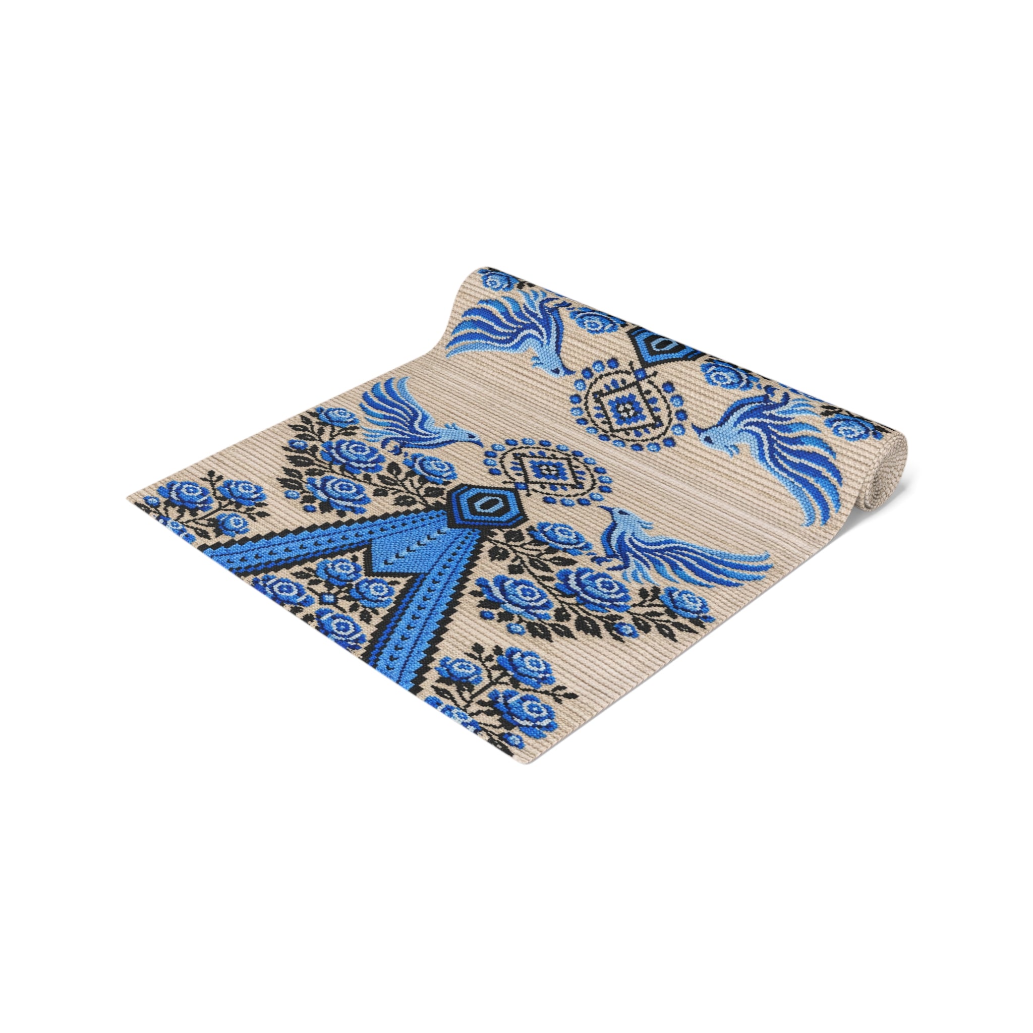 Ukrainian Berehynia table runner with blue black folk art pattern on dining table
