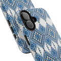 Blue Sky Folk Art tough phone case with Ukrainian heritage geometric embroidery pattern — striking blue folk motifs in textile-like 3D wrap design, dual-layer shockproof iPhone cover in glossy or matte finish

