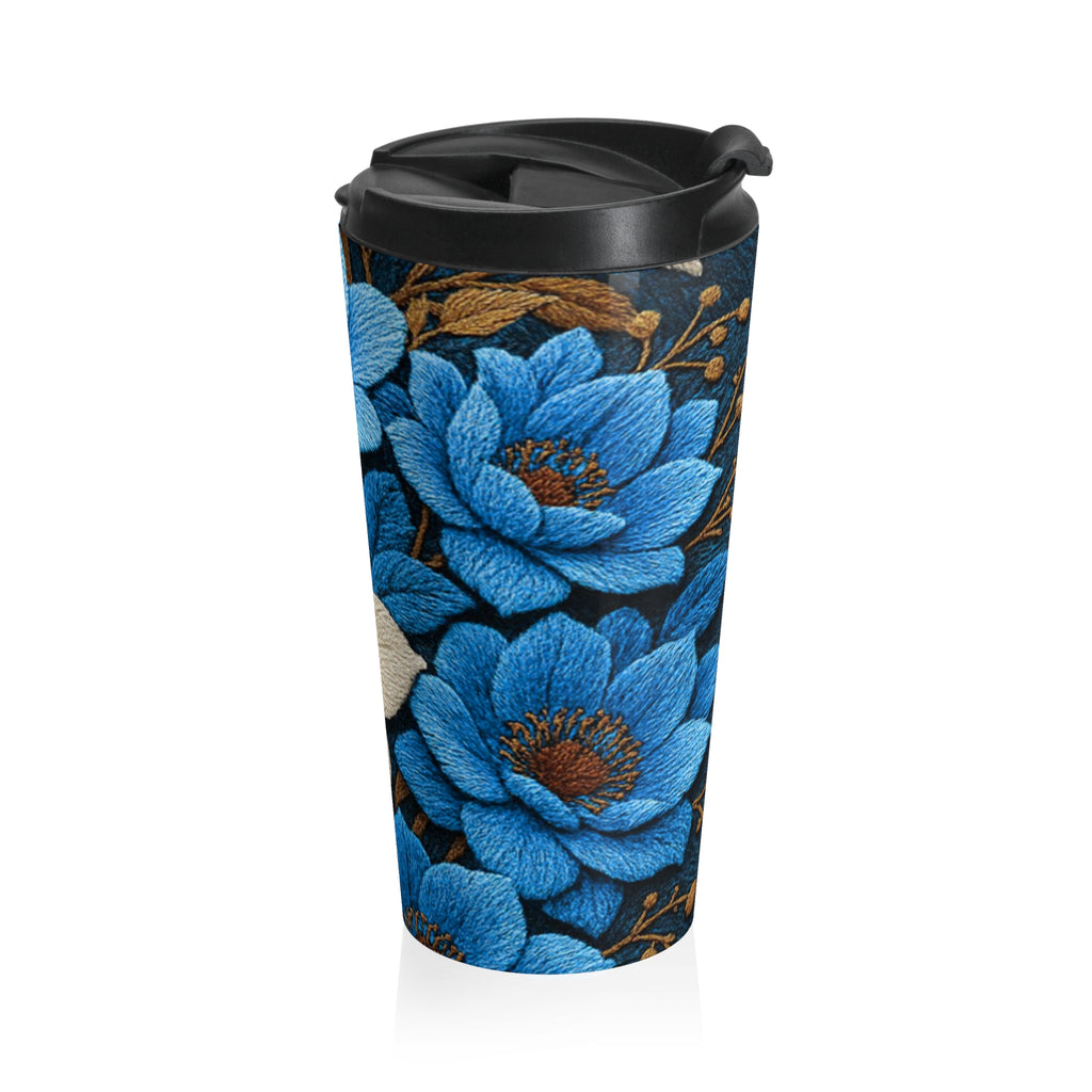 Stainless steel travel mug with the Midnight Symphony design, featuring a vibrant wraparound blue and cream floral pattern on a dark background with a black flip-top lid.