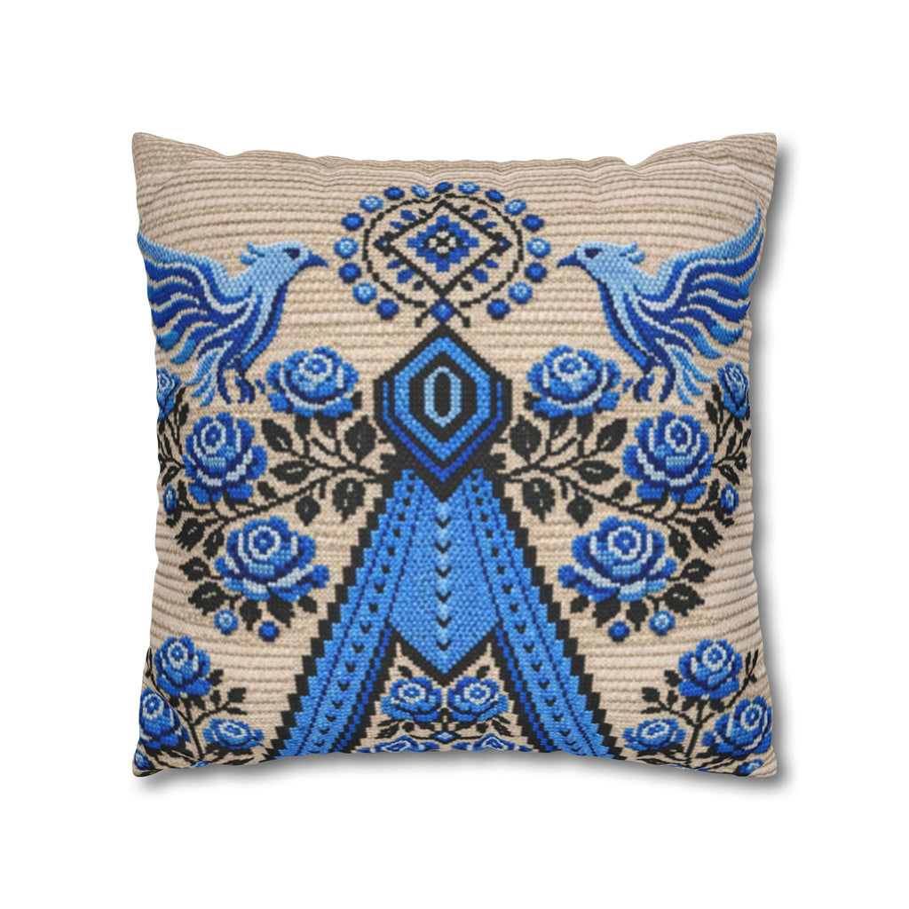 Ukrainian Berehynia throw pillow with blue black folk art pattern on sofa

