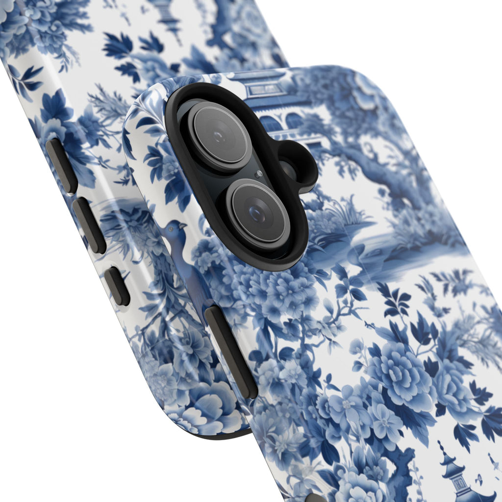 Blue toile chinoiserie phone case with vintage indigo floral pattern — delicate birds, blooms and branches in classic blue and white, dual-layer shockproof iPhone cover in glossy or matte finish

