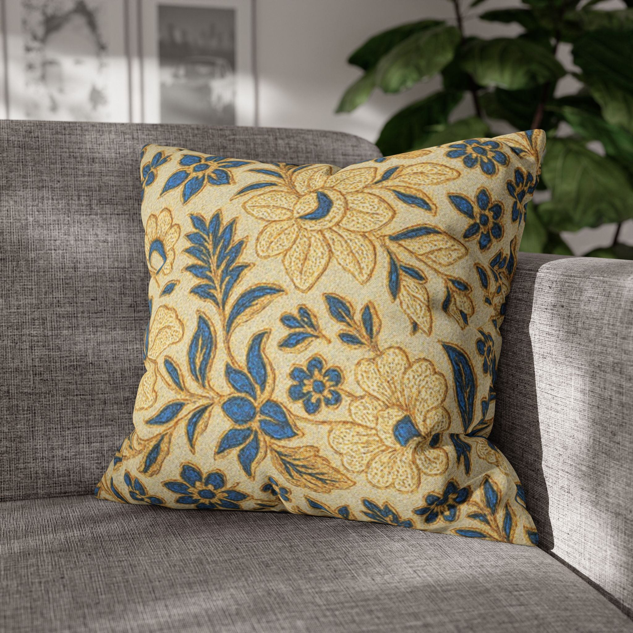 Square decorative pillowcase with a vintage floral pattern featuring gold flowers and teal blue leaves on a light beige background, spun polyester fabric with a concealed zipper.