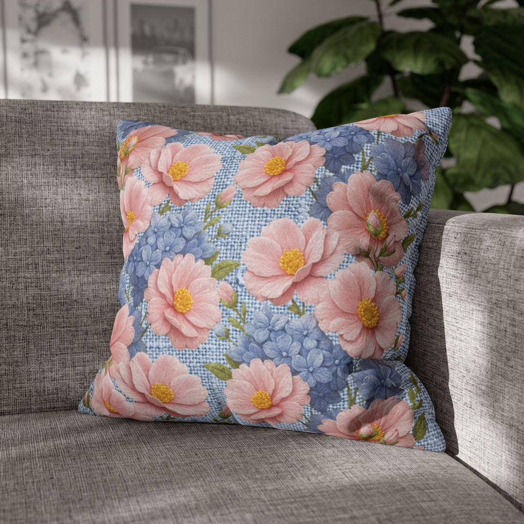 Square floral pillowcase from the Soft Provence collection featuring pink peonies and blue hydrangeas on a textured blue background with a concealed zipper.