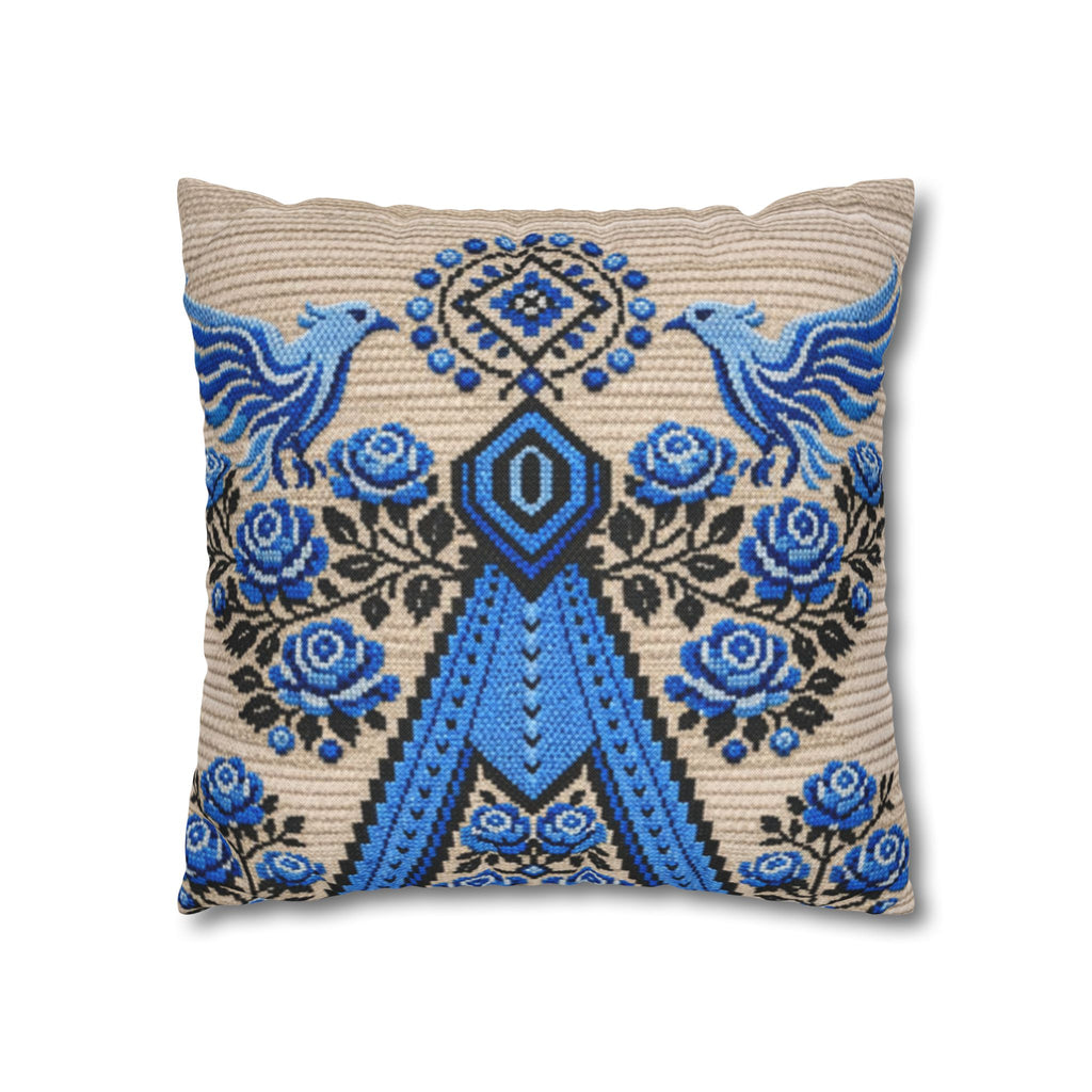 Ukrainian Berehynia throw pillow with blue black folk art pattern on sofa
