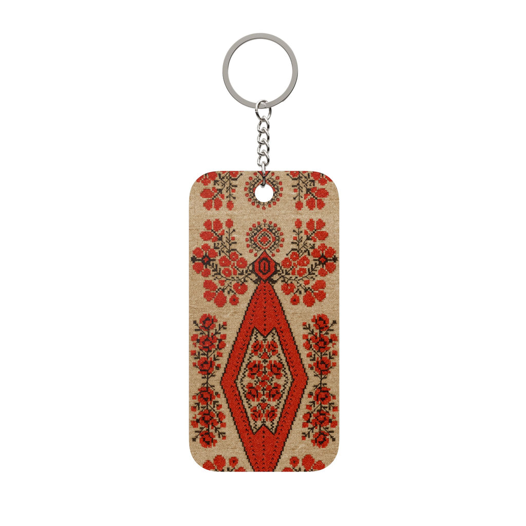 Ukrainian Berehynia keychain with red floral folk art pattern

