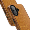 Trypillian Code tough phone case with ancient Ukrainian terracotta symbols — solar cross, guardian figure and spiral motifs in warm ochre and chestnut tones, dual-layer shockproof iPhone cover


