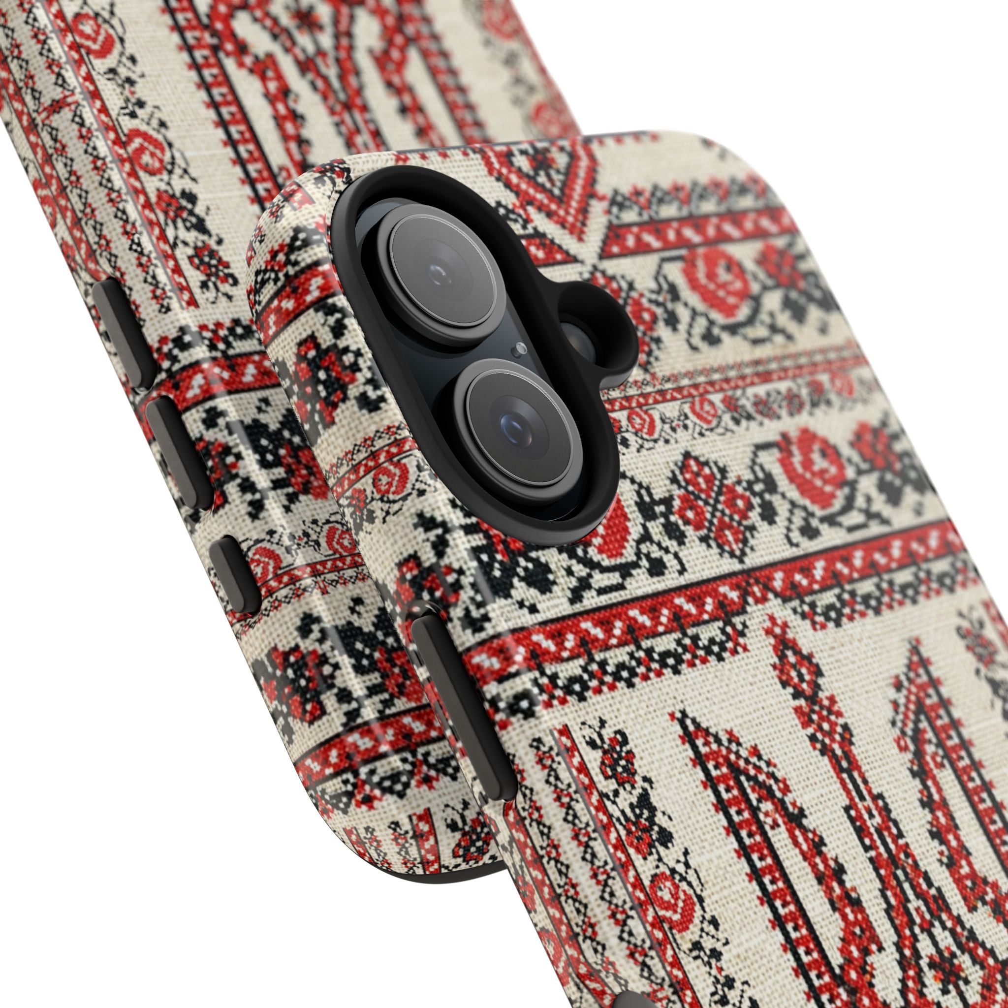 Tryzub Ukrainian phone case with red and black folk embroidery — iconic Ukrainian trident national symbol surrounded by traditional cross-stitch motifs, dual-layer shockproof iPhone cover

