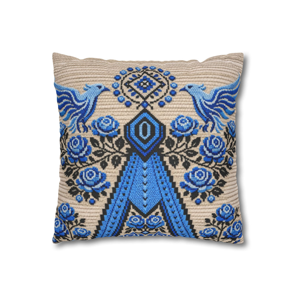 Ukrainian Berehynia throw pillow with blue black folk art pattern on sofa
