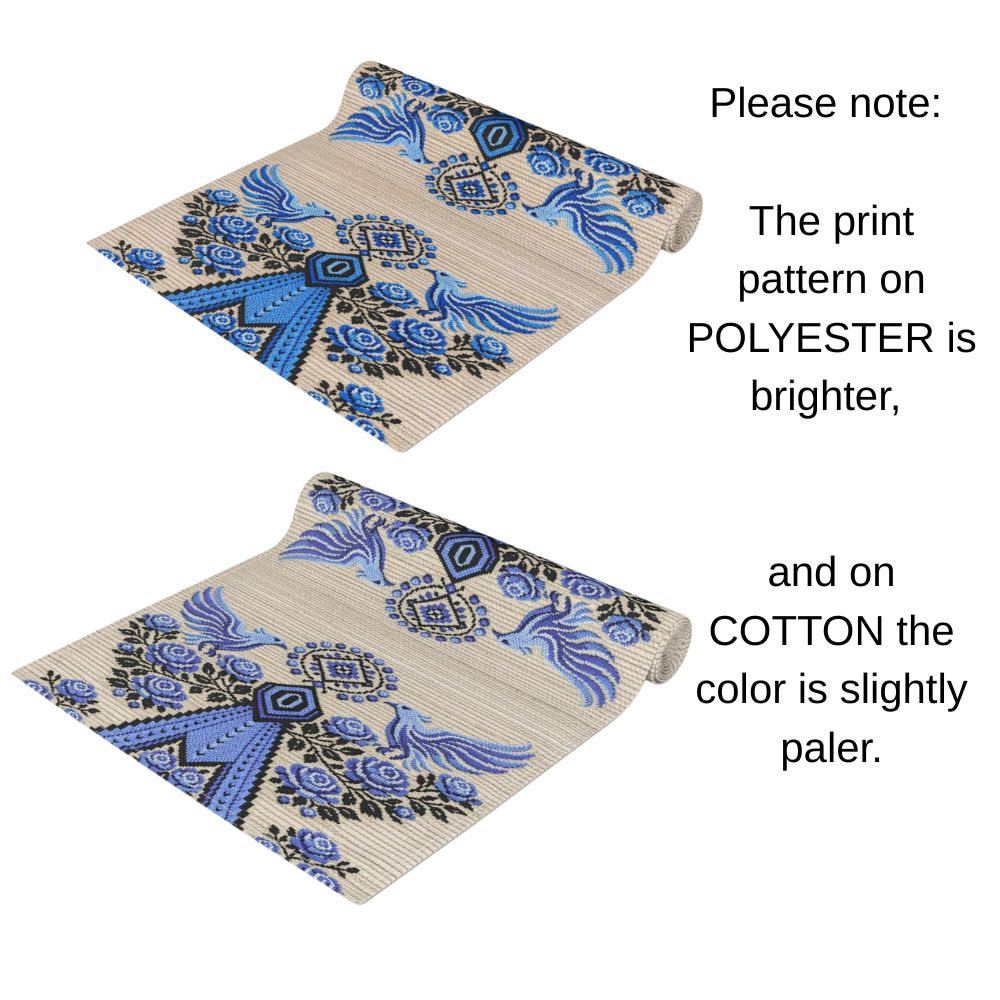 Ukrainian Berehynia table runner with blue black folk art pattern on dining table
