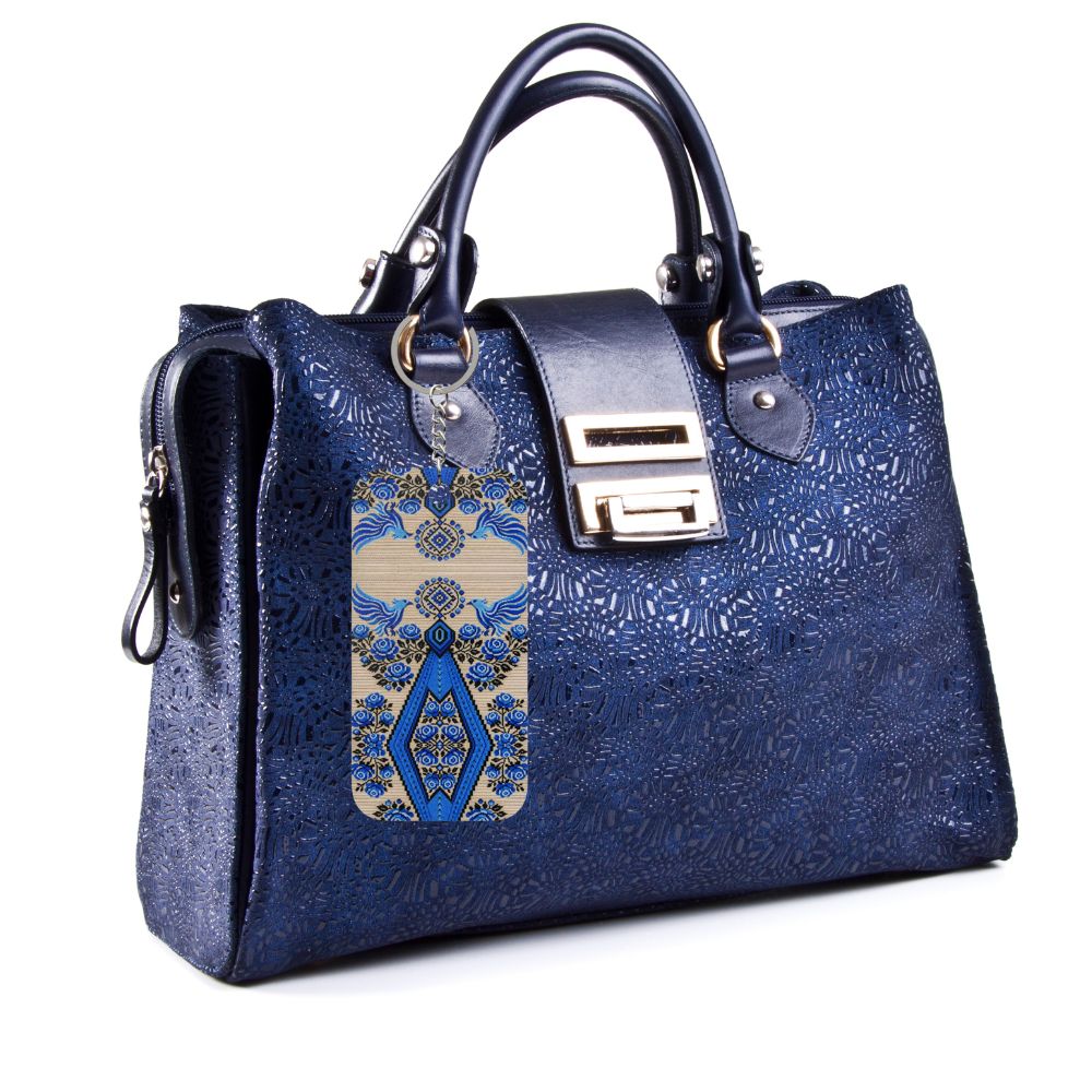 Ukrainian Berehynia keychain with blue black geometric folk art pattern
