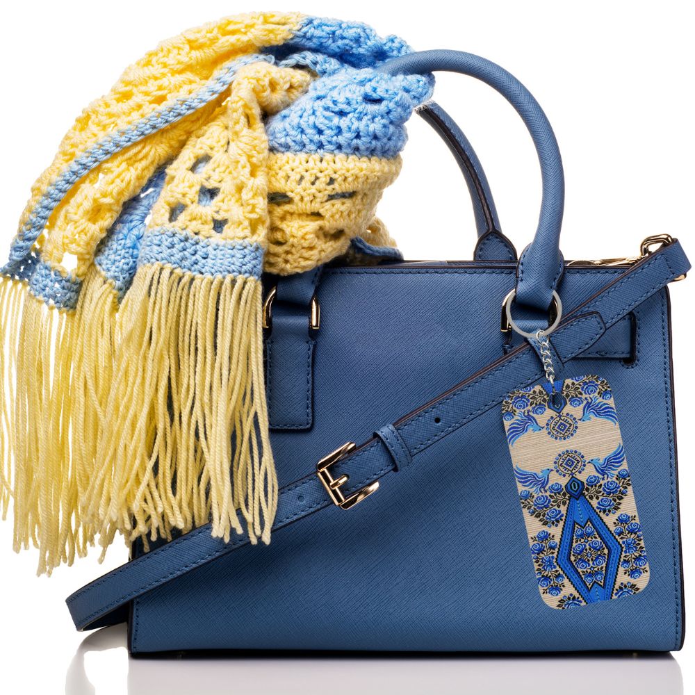 Ukrainian Berehynia keychain with blue black geometric folk art pattern
