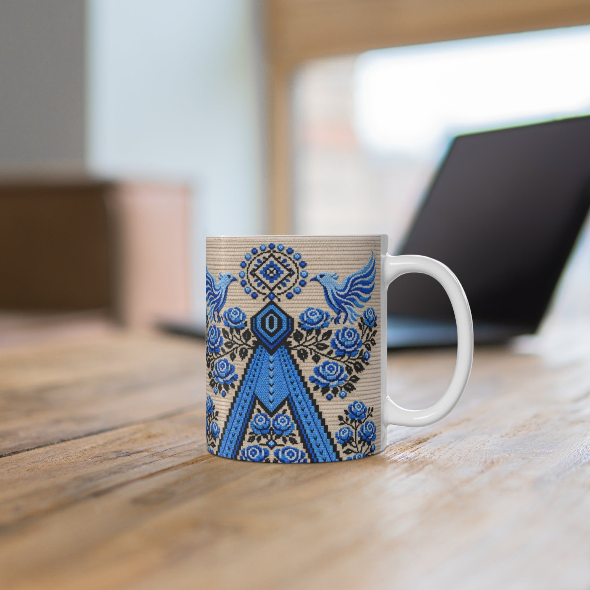 Ukrainian Berehynia mug with blue black folk art geometric pattern
