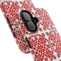 Mariia Red tough phone case with Ukrainian folk embroidery — bold red and black geometric cross-stitch pattern inspired by traditional Slavic motifs, dual-layer shockproof iPhone cover

