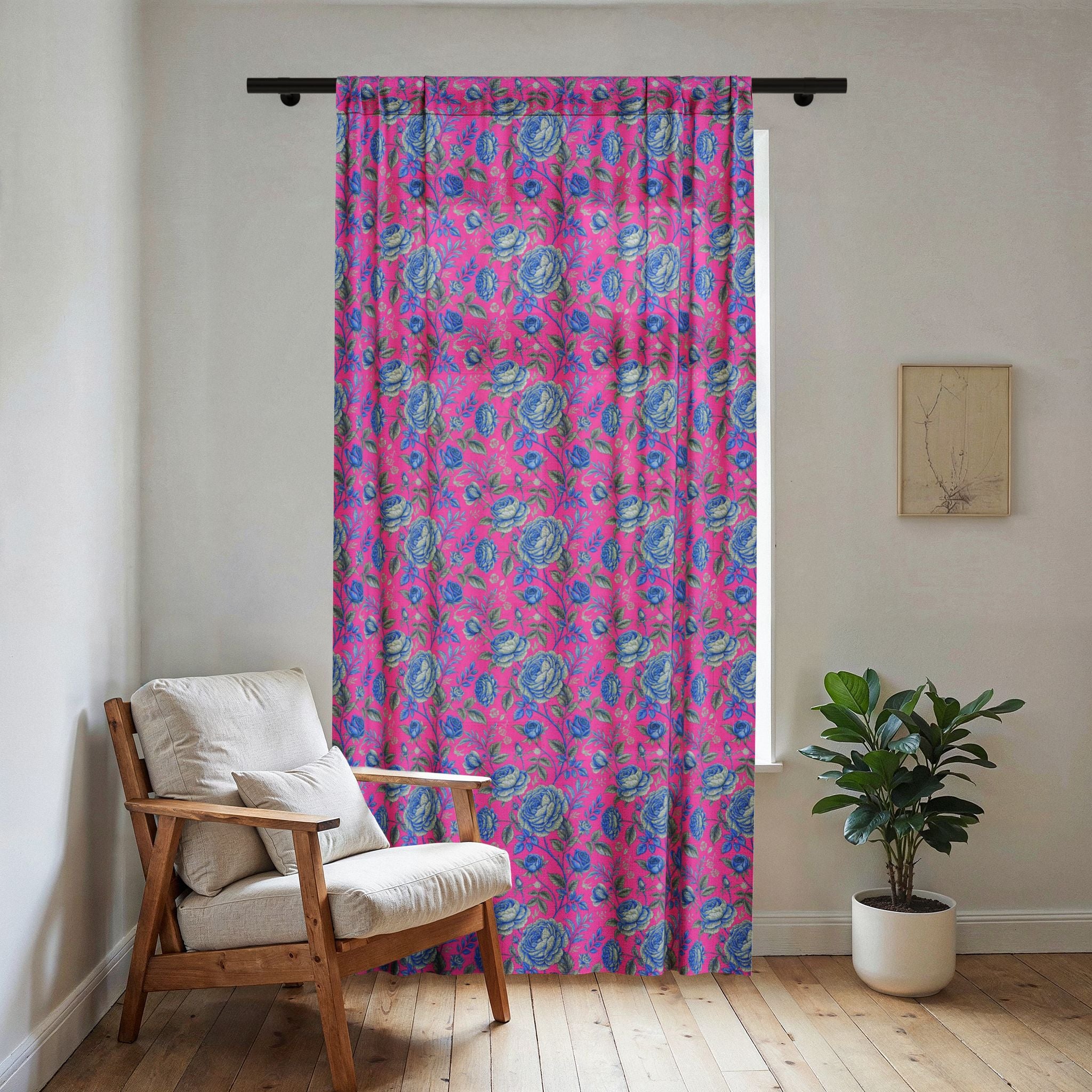 Sheer white window curtain with a vibrant pink and blue watercolor floral pattern, softly filtering bright sunlight in a modern airy room.
