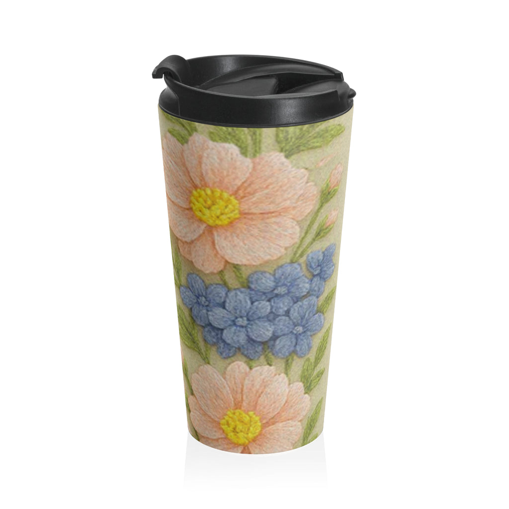 Stainless steel travel mug from the Wooly Garden collection with a 3D effect floral print of pink daisies and blue hyacinths.
