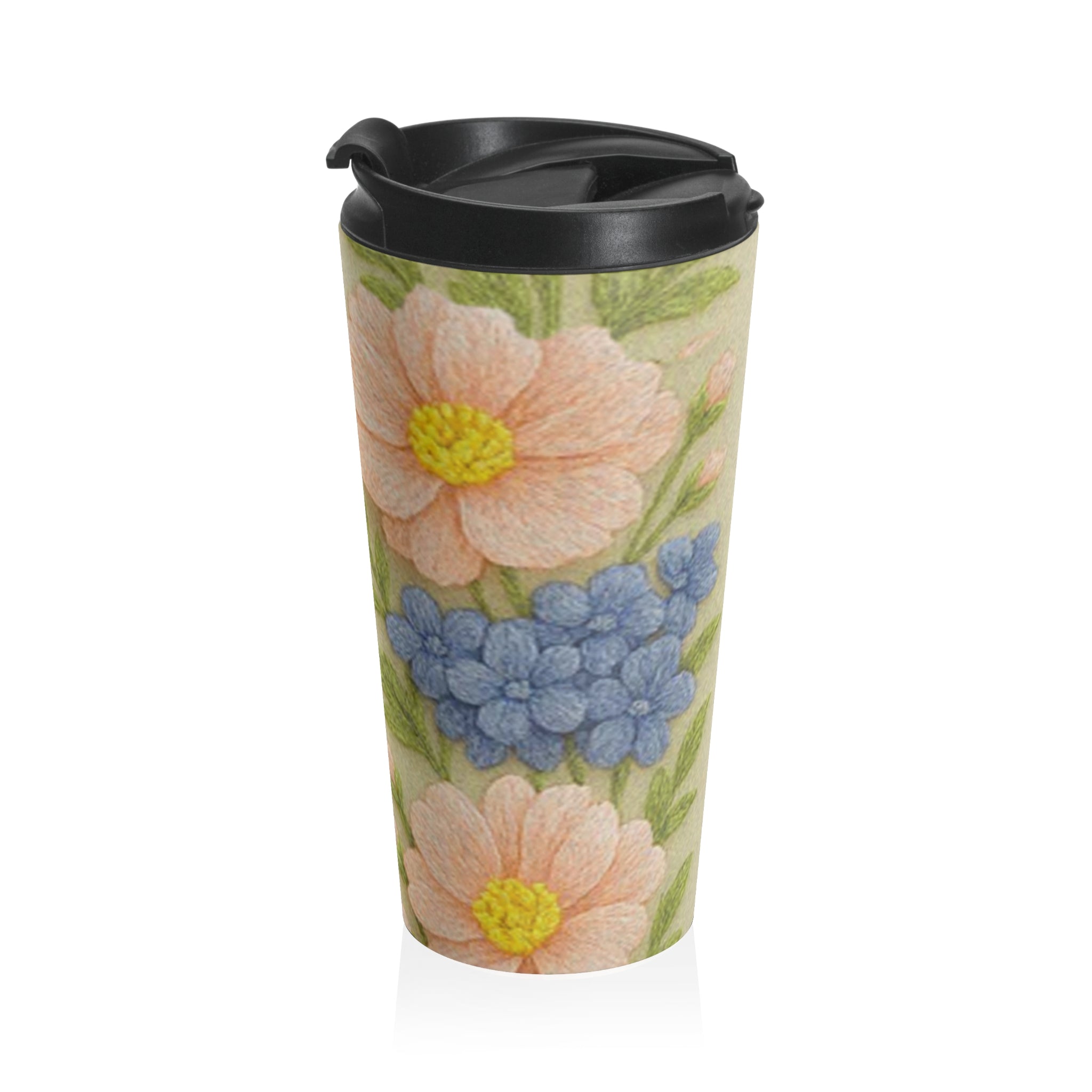 Stainless steel travel mug from the Wooly Garden collection with a 3D effect floral print of pink daisies and blue hyacinths.