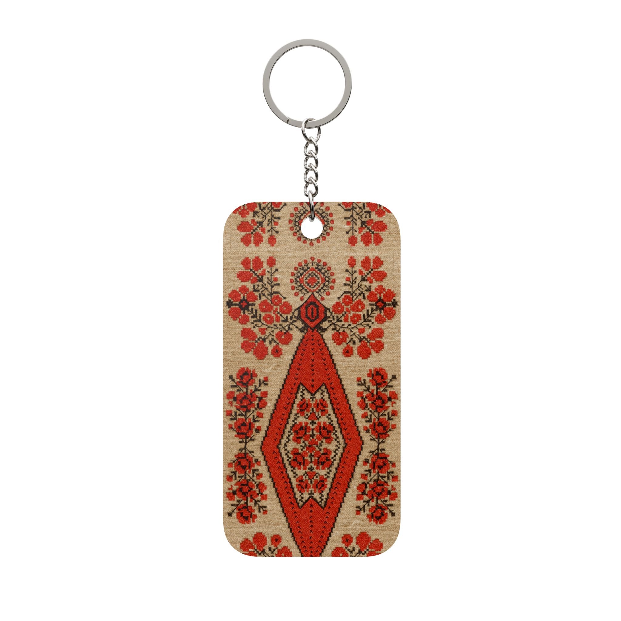 Ukrainian Berehynia keychain with red floral folk art pattern
