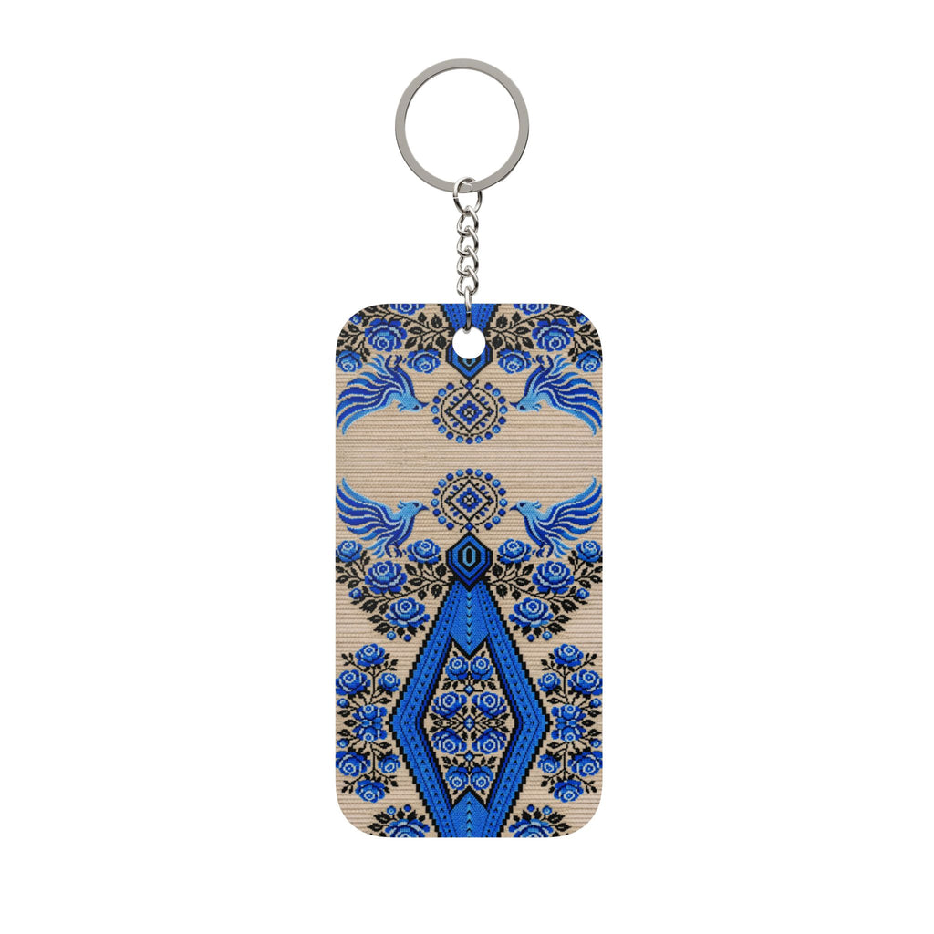 Ukrainian Berehynia keychain with blue black geometric folk art pattern

