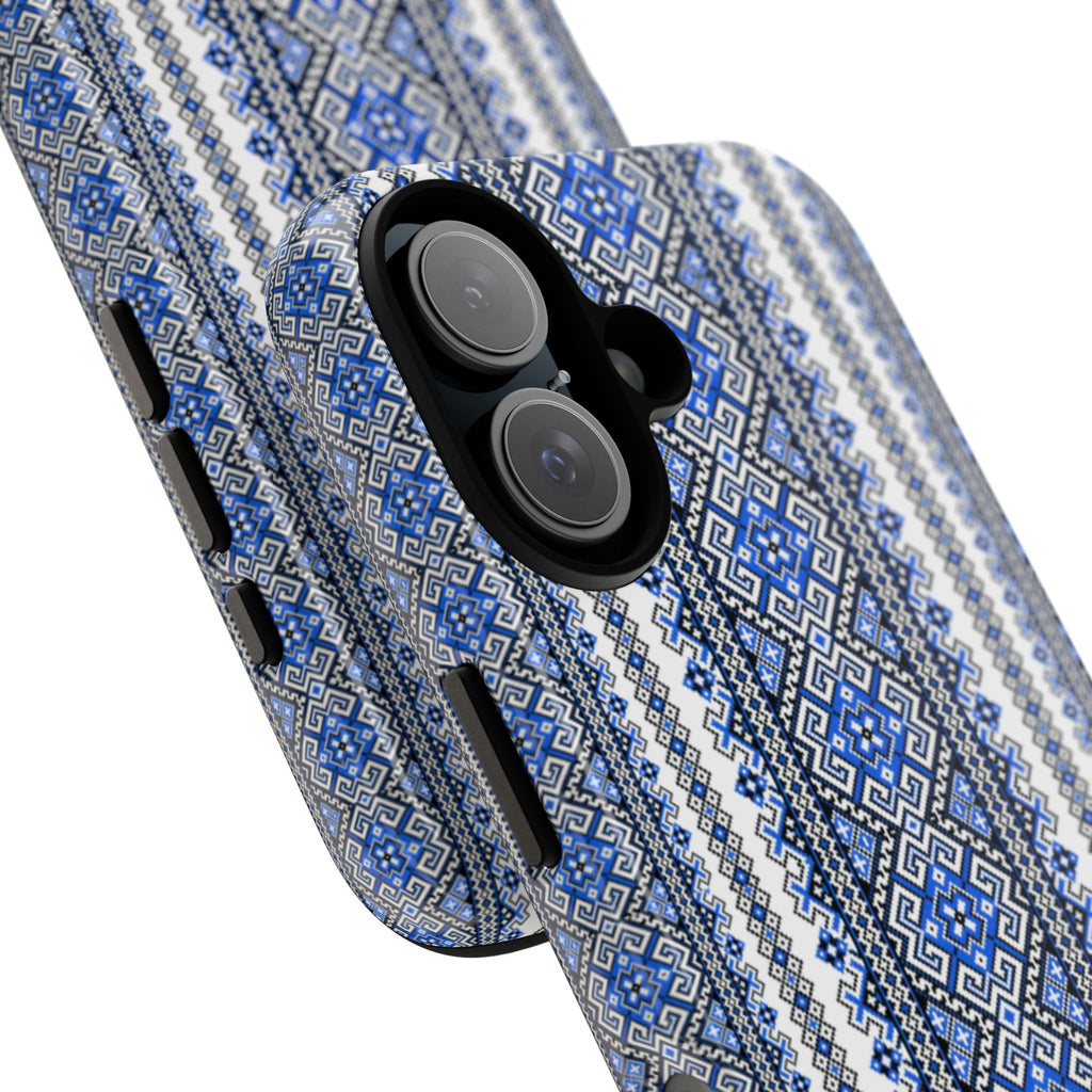 Protective iPhone case from the Stasia Blue Collection featuring a full-wrap blue and black Ukrainian folk embroidery pattern.
