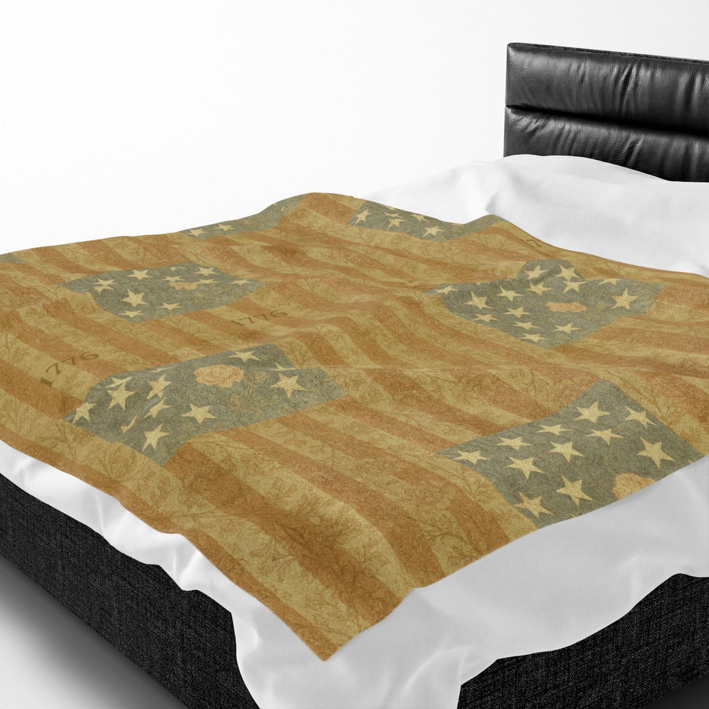 Heritage 1776 Collection plush velveteen blanket featuring a rustic vintage American flag design with faded stars and stripes in a wabi-sabi farmhouse style
