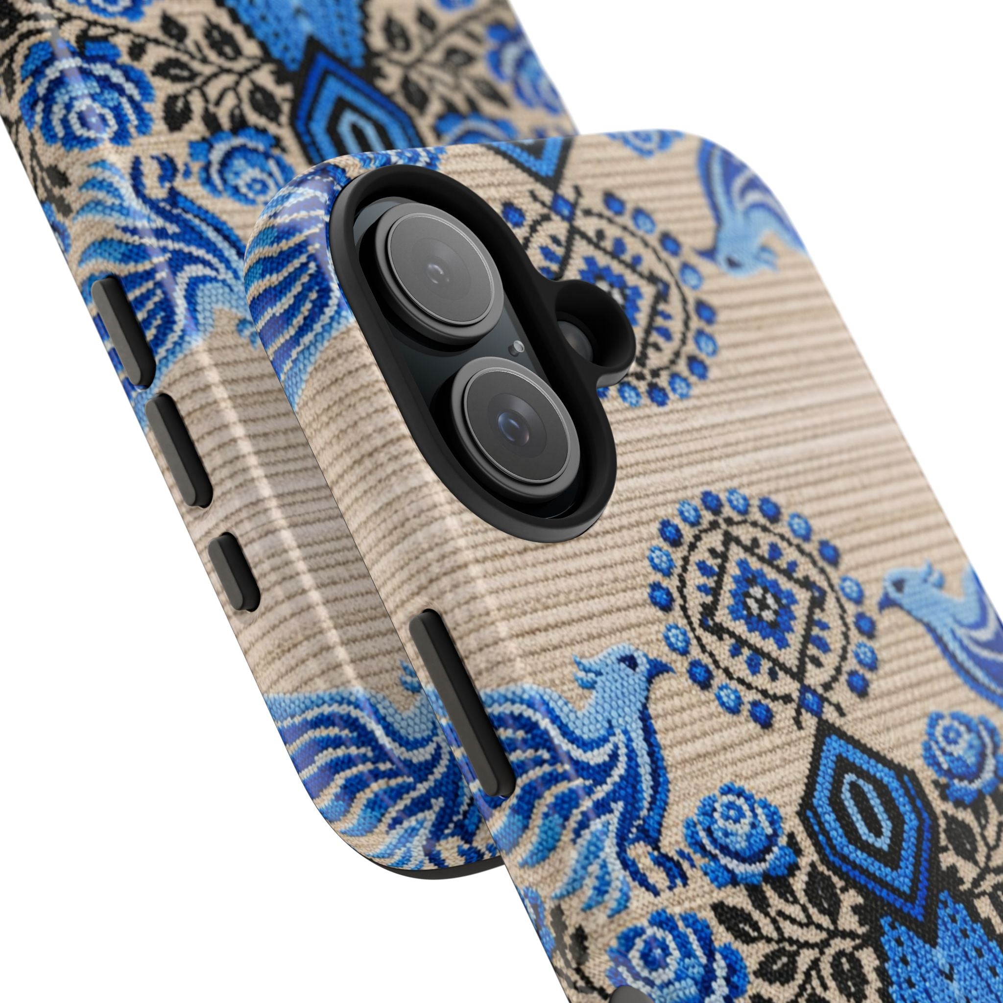 Ukrainian Berehynia phone case with blue and black folk art design — falcons, roses and geometric embroidery-inspired motifs on warm linen background, dual-layer shockproof iPhone cover

