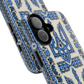 A durable dual-layer phone case featuring a high-definition 3D wrap print. The design shows a cream background with a central blue and black Ukrainian Trident (Tryzub) and traditional floral folk embroidery patterns covering the entire surface.
