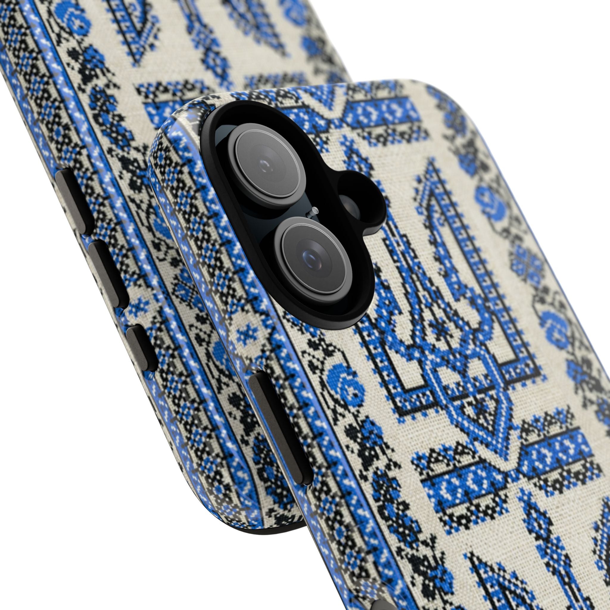 A durable dual-layer phone case featuring a high-definition 3D wrap print. The design shows a cream background with a central blue and black Ukrainian Trident (Tryzub) and traditional floral folk embroidery patterns covering the entire surface.
